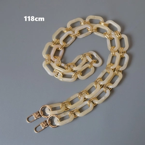 Detailed view of 118cm cream marble acrylic and gold metal chain strap for handbags