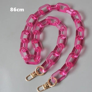 Detailed view of an 86cm translucent pink acrylic bag chain with gold lobster clasps