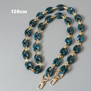 Detail of 120cm green marble resin bag strap with gold metal rings and lobster clasps