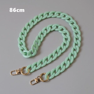 Detail of 86cm mint green acrylic resin fishbone chain strap with gold lobster clasps