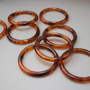 Detailed view of 10cm resin round handles with tortoise shell pattern for DIY craft
