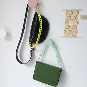 Stylish crossbody bags with vibrant acrylic chunky chains in black and dark green leather