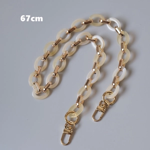 Detail view of 67cm creamy white acrylic chain with gold metal links and lobster clasps