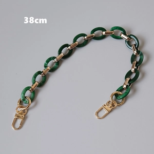 Detail view of 38cm dark green acrylic resin chain with gold metal links and lobster clasps