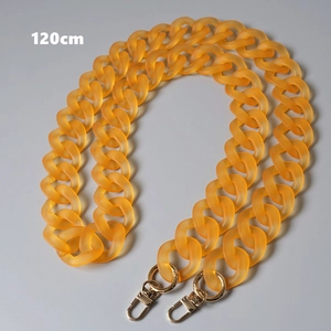 Detail of 120cm orange acrylic resin chain strap with gold metal rotating clasps