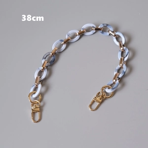 Detail of 38cm marble acrylic resin chain with gold metal lobster clasps for bags
