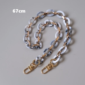 Detailed 67cm marble resin bag strap with white acrylic links and gold lobster clasps
