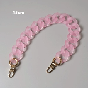 Detailed view of 45cm matte pink acrylic chain with golden metal lobster clasps