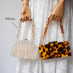 Vintage acrylic top-handle handbag with thick resin chain strap and shell texture