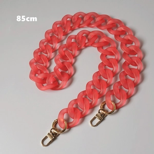 Close-up of 85cm coral pink frosted acrylic chain strap with gold lobster clasps