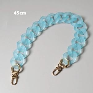 Detail of 45cm light blue matte acrylic resin bag chain with gold metal lobster clasps