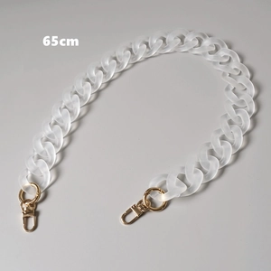Detailed view of a 65cm matte white acrylic bag chain with sturdy gold lobster clasps