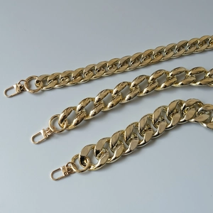 Detailed view of three widths of polished gold metal replacement chains with lobster clasps