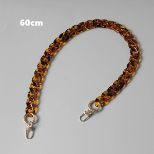 Detailed view of a 60cm leopard print acrylic bag chain with golden metal lobster clasps