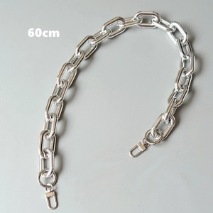 Detailed view of 60cm silver metal chain strap with polished lobster clasps for bags