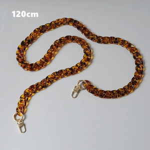 Detail view of 120cm leopard print acrylic resin bag chain with gold metal swivel clasps