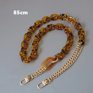Detail view of 85cm tortoiseshell acrylic and gold metal chain strap for handbags