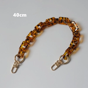Detail view of 40cm vintage leopard acrylic resin bag chain with gold swivel clasps