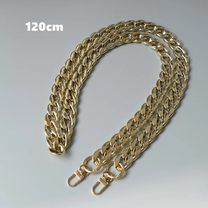 Close-up of 120cm chunky gold chain strap with metallic lobster clasps and round buckles