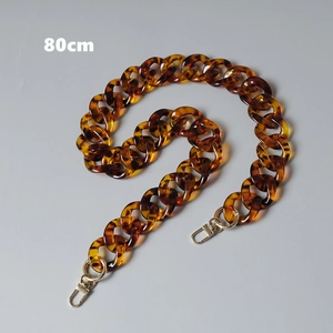 Detail of 80cm vintage leopard acrylic chain with golden metal lobster clasps