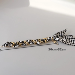 Short handbag chain with black white houndstooth fabric and gold metal lobster clasp
