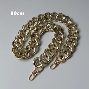 Close-up of 80cm gold chunky chain strap with metal lobster clasps for handbags