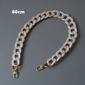 Detailed view of 60cm beige marble acrylic resin bag strap chain with gold lobster clasps