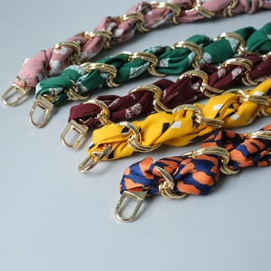 Detail of five colorful floral silk scarf woven purse chains with gold metal clasps