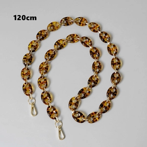 Detail of 120cm leopard print acrylic resin chain strap with gold lobster clasps
