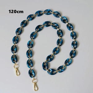 Detail view of 120cm blue marble resin chain with golden metal lobster clasps