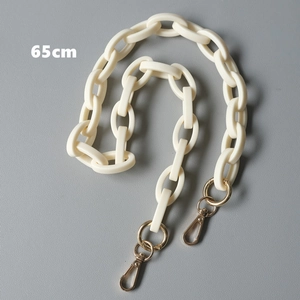 Detail view of 65cm cream acrylic thick chain strap with gold lobster clasps