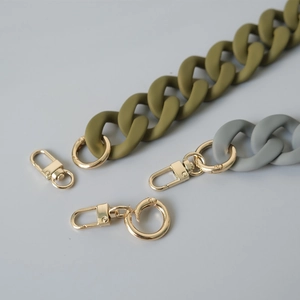 Matte acrylic resin handbag chain strap in olive green and blue with gold hardware