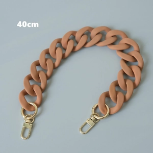 Detail of 40cm matte orange resin chain strap with gold metal buckles for handbags
