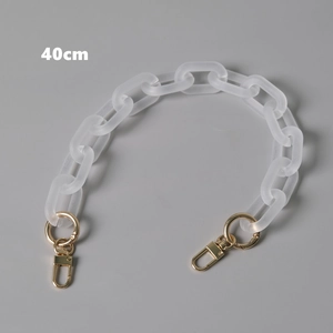 Detail view of 40cm matte acrylic resin bag chain with gold metal lobster clasps