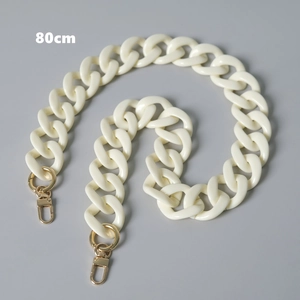 Detail view of 80cm cream resin acrylic chain strap with gold metal swivel clasps