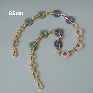Detail of 85cm colorful acrylic resin and gold metal chain strap for handbags