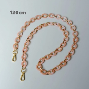 Bandoulière en résine acrylique rose avec fermoirs dorés et détails de 120 cm