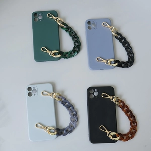 Colorful resin fishbone chain phone cases in dark green, blue, gray, and black colors