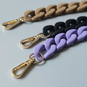 Matte resin chain bag straps in khaki, black, and lavender with gold metal clasps