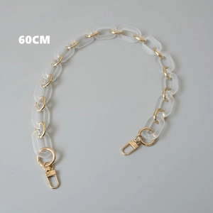 Close-up of 60cm acrylic frosted chain strap with gold-tone lobster clasps for handbags