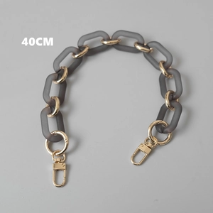 Detail of 40cm frosted gray acrylic and gold metal chain strap with lobster clasps