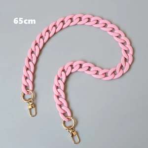 Macro view of 65cm pink matte acrylic chunky chain with gold lobster clasps for handbags