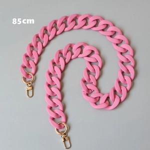 Detail of 85cm pink matte resin bag strap with light gold metal lobster clasps