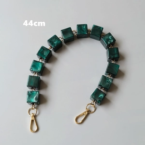 Detail view of 44cm green marble resin acrylic bag chain with gold lobster clasps