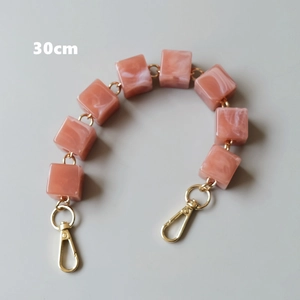 Detail of 30cm pink marble texture acrylic chain with gold clasps for handbags