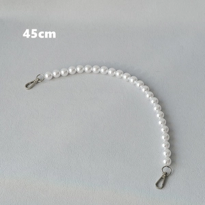 Detail of 45cm white pearl bag strap with silver metal lobster clasps for handbags