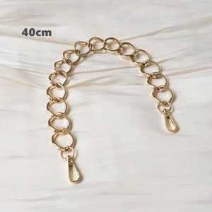 Detailed 40cm golden metal handbag chain with irregular round links and lobster clasps