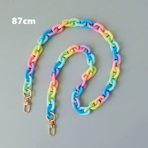 Detailed macro view of 87cm colorful acrylic crossbody chain with golden lobster clasps