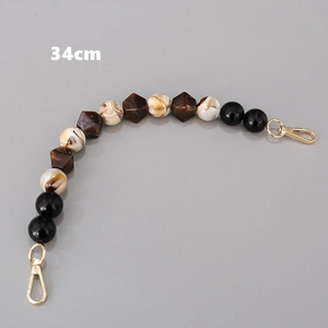 Detail of 34cm vintage resin handbag chain with brown marble acrylic beads and gold clasps