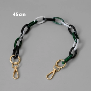 Detail of 45cm marbled resin bag chain strap with gold lobster clasps and large links